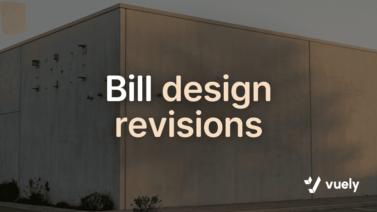 Bill design revisions. A blank concrete storefront facade with exposed mounting brackets awaits a sign installation during golden hour.