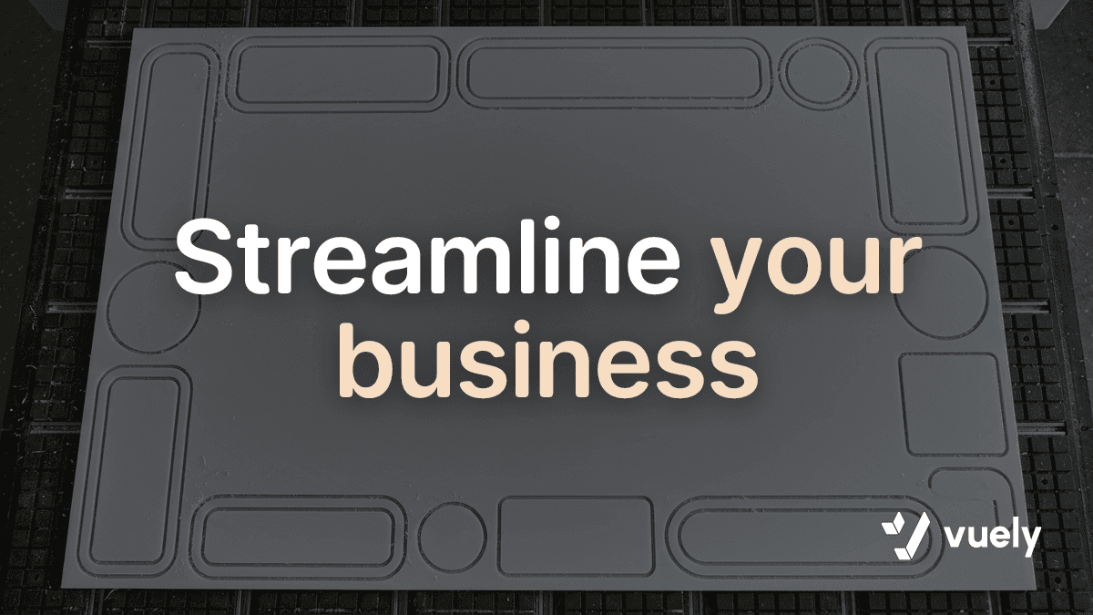 Streamline your business. Overhead view of a CNC router table with freshly cut acrylic sign blanks around an empty center.